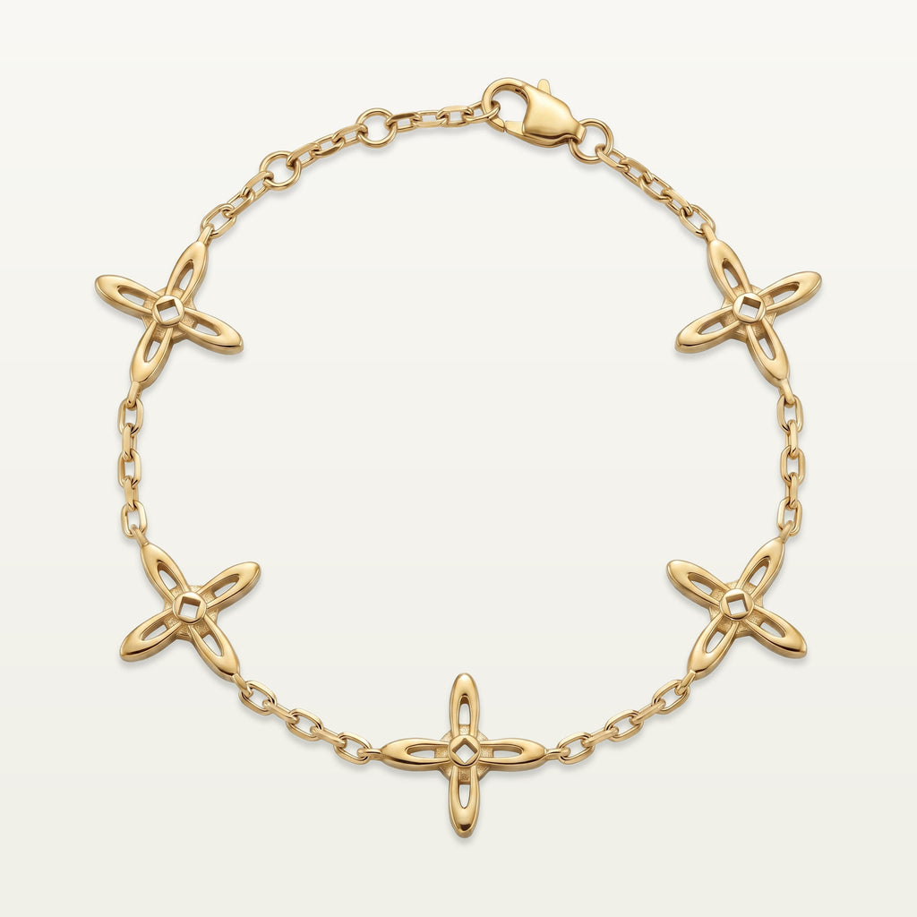 Ovis & Co. Celestial Armband Gold – Edelstahlarmband mit 5 filigranen Kreuz-Anhängern, designed in Frankfurt