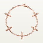 Ovis & Co. Celestial Armband Roségold – Edelstahlarmband mit 5 filigranen Kreuz-Anhängern, langlebige Veredelung, designed in Frankfurt