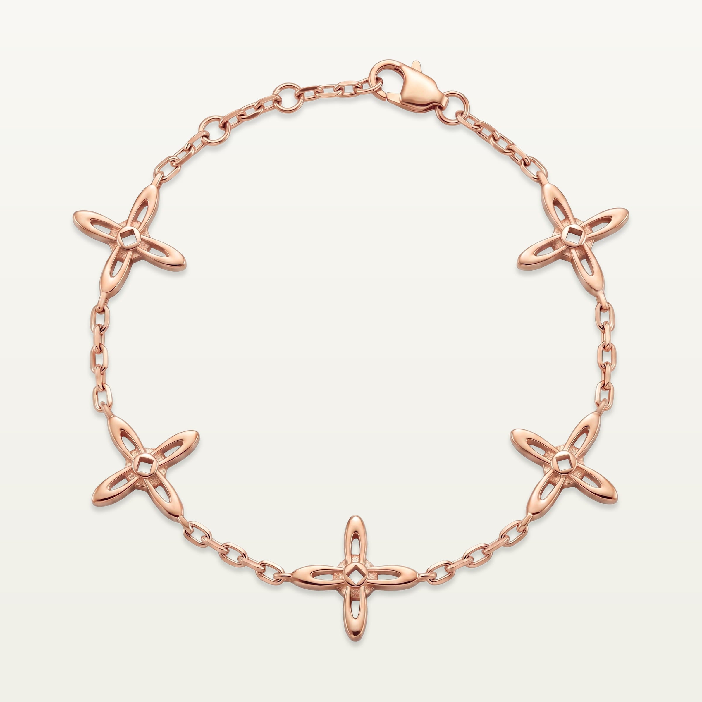 Ovis & Co. Celestial Armband Roségold – Edelstahlarmband mit 5 filigranen Kreuz-Anhängern, langlebige Veredelung, designed in Frankfurt
