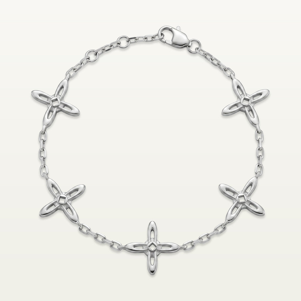 Ovis & Co. Celestial Armband Silber – Edelstahlarmband mit 5 filigranen Kreuz-Anhängern, designed in Frankfurt